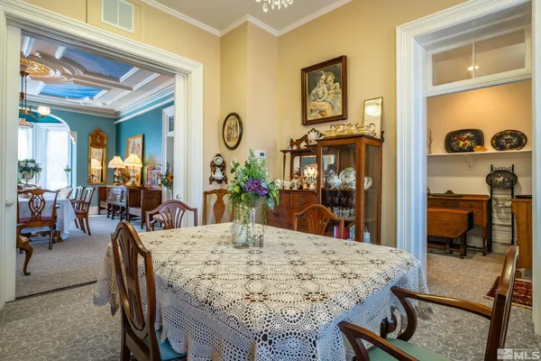 a view of a dining room with furniture