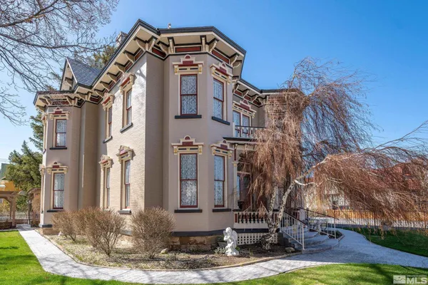 a front view of a house with swimming pool