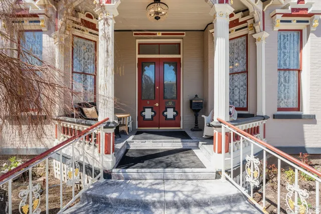 a view of balcony and with staircase