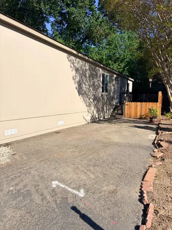 a view of a back yard of the house