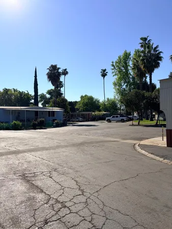 a view of a park with a houses