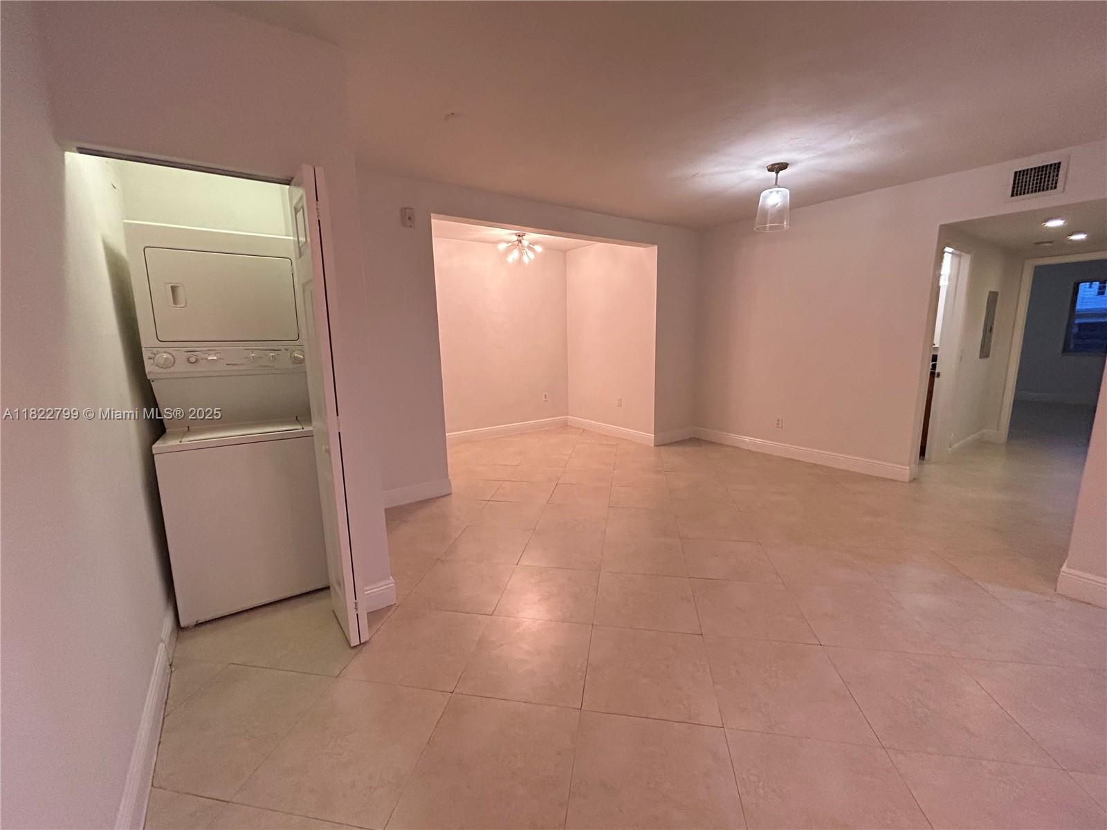 2880 Pine Tree Drive, Unit 1 Miami Beach, FL 33140 - Photo 13 of 13 an empty room with a bathroom