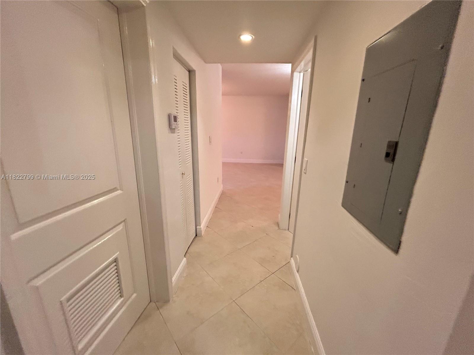 2880 Pine Tree Drive, Unit 1 Miami Beach, FL 33140 - Photo 6 of 13 a view of a hallway