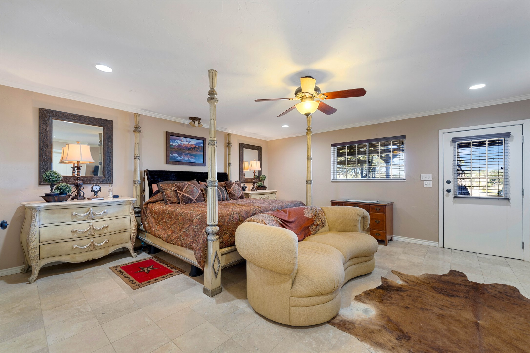7702 Ranch Road 965 Llano, TX 78643 - Photo 16 of 40 a living room with furniture kitchen view and a chandelier