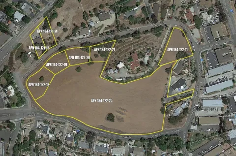 an aerial view of a highlighted house