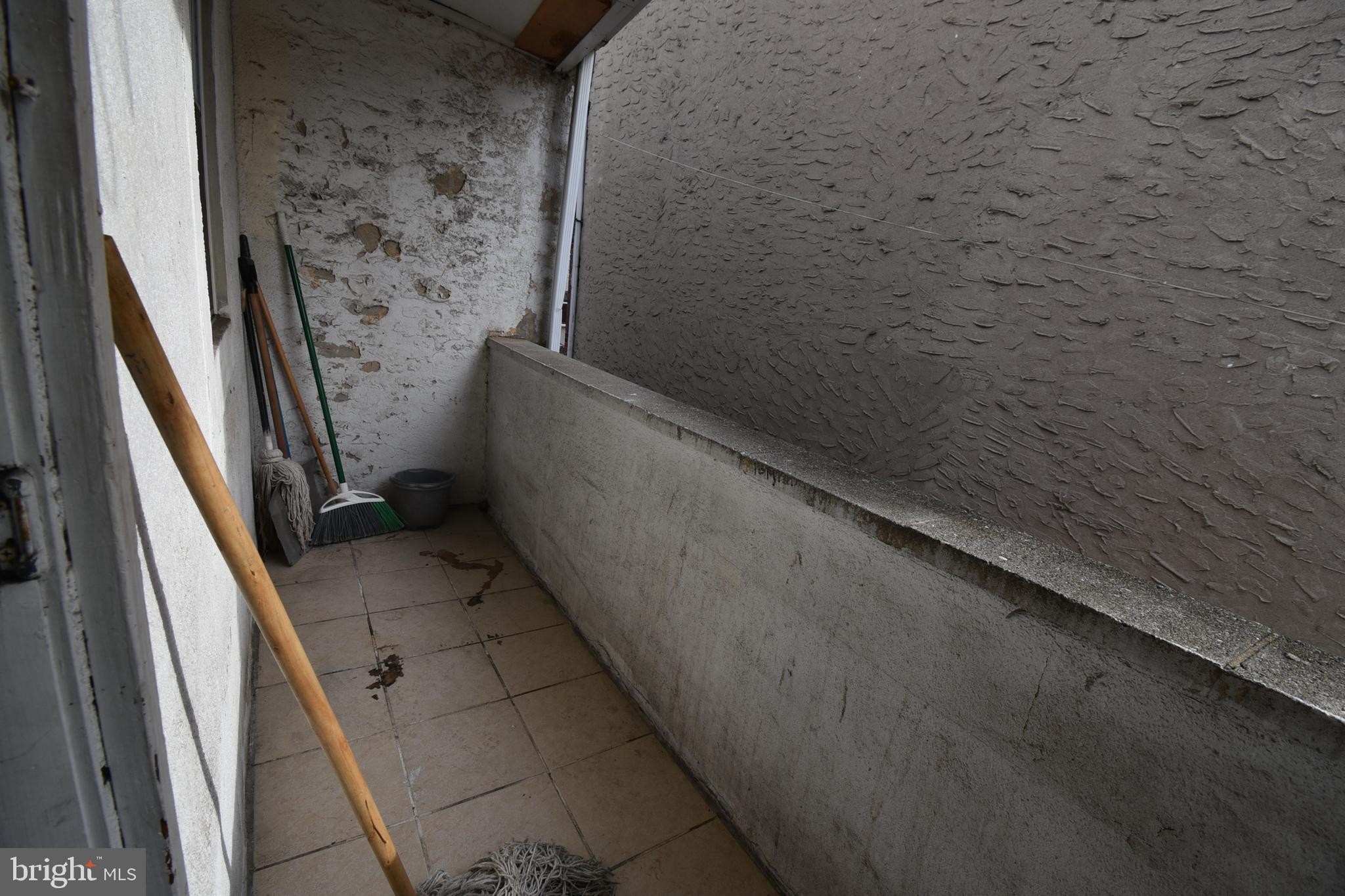 1303 South 8th Street Philadelphia, PA 19147 - Photo 12 of 22 a view of balcony with wooden floor