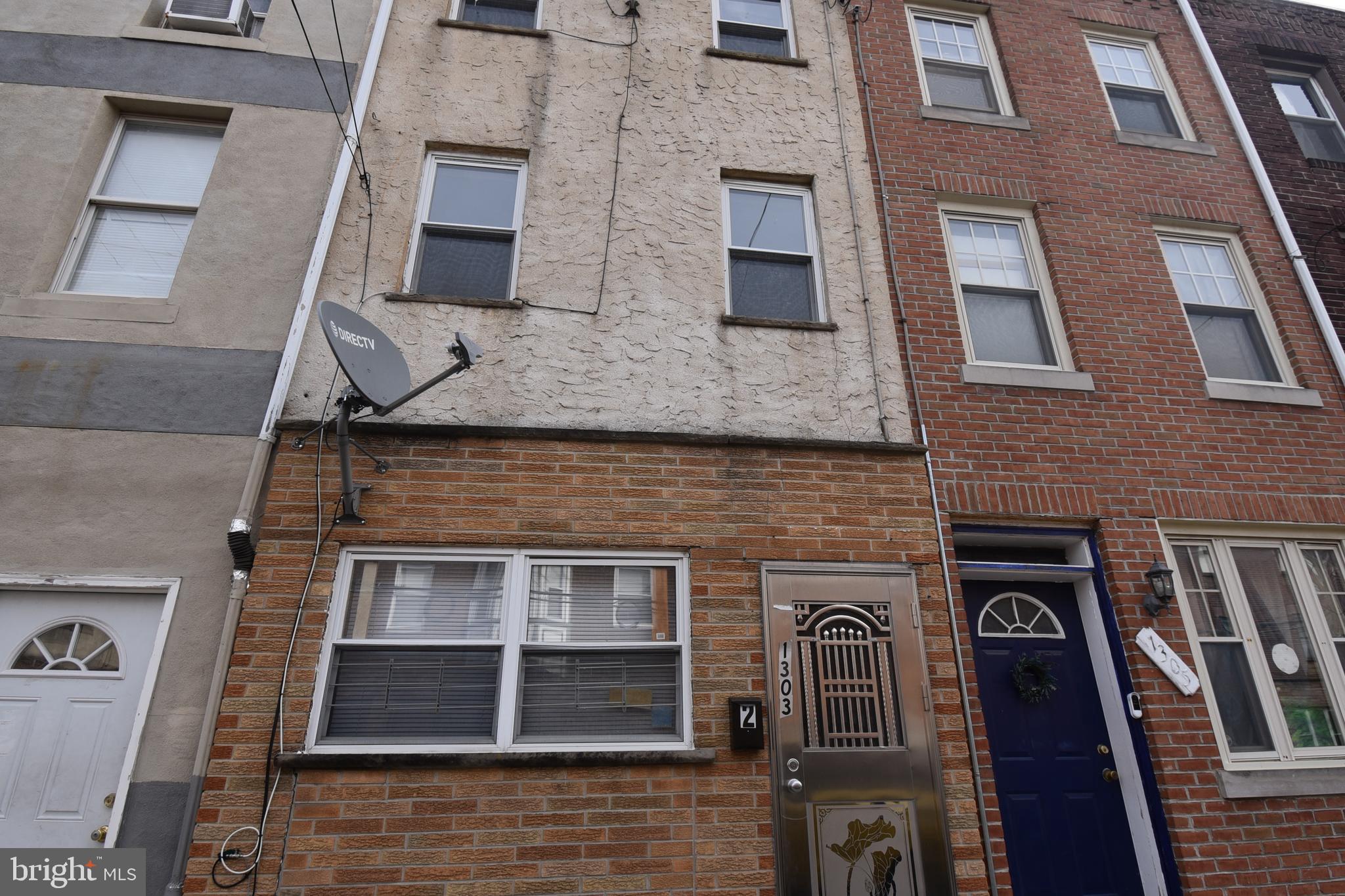 1303 South 8th Street Philadelphia, PA 19147 - Photo 3 of 22 front view of a building