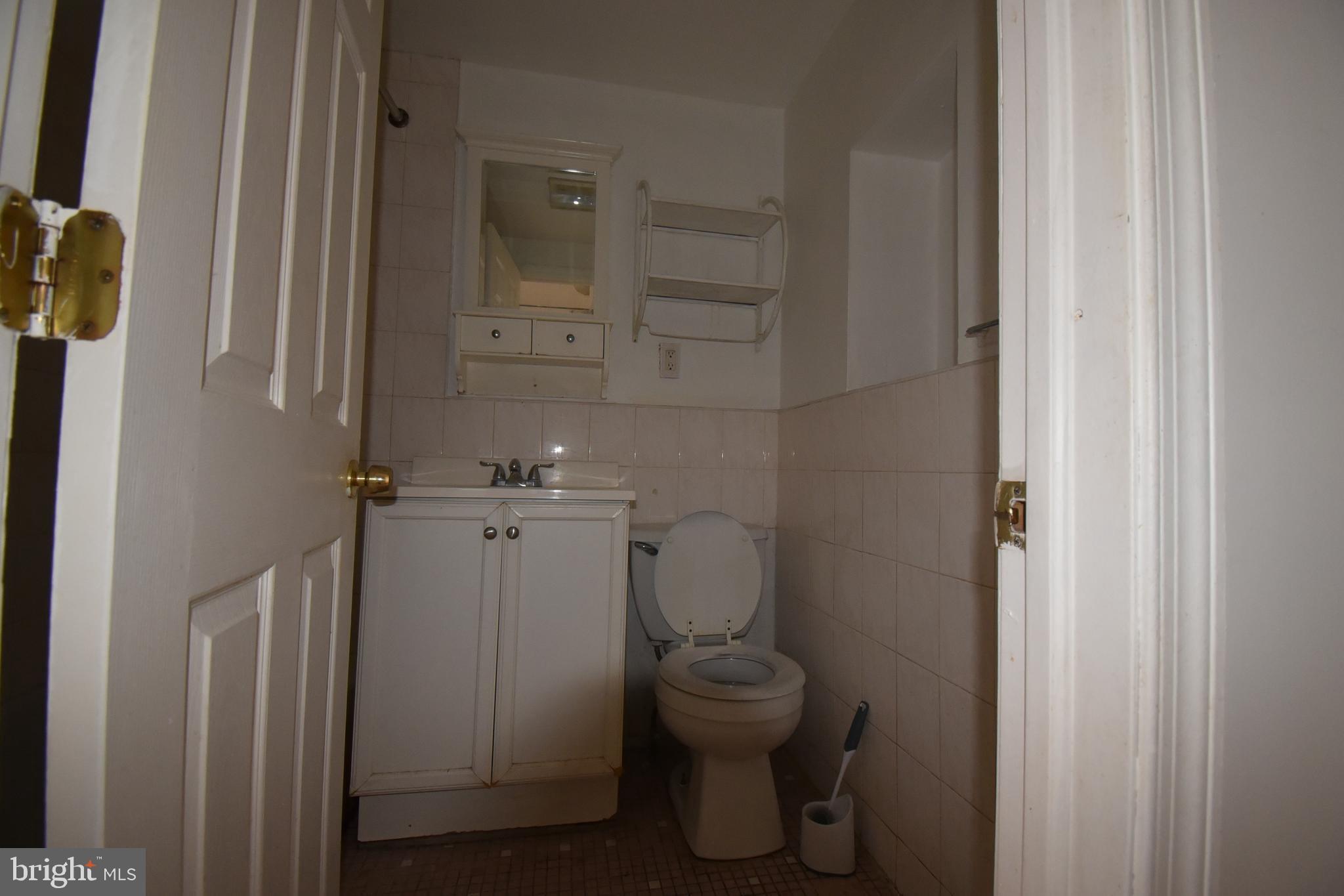 1303 South 8th Street Philadelphia, PA 19147 - Photo 8 of 22 a bathroom with a toilet and a shower