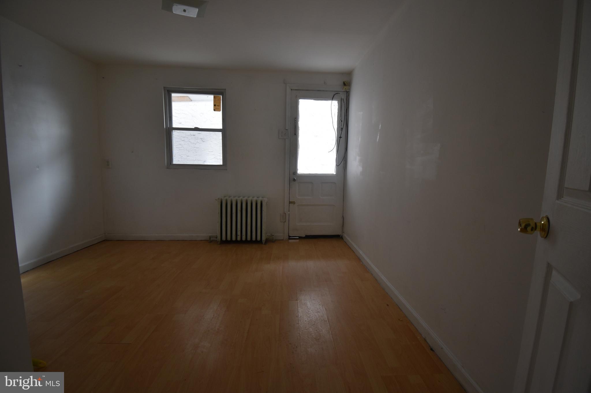 1303 South 8th Street Philadelphia, PA 19147 - Photo 10 of 22 an empty room with windows
