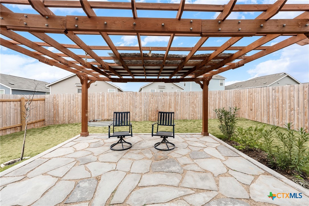 517 Texas Angel Way Jarrell, TX 76537 - Photo 27 of 35 a view of swimming pool with a table and chairs in patio