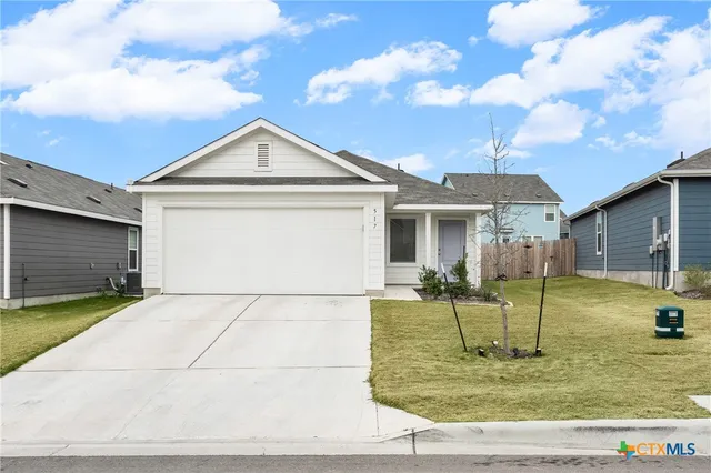 a view of a house with entertaining space