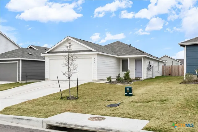 a view of a house with a patio
