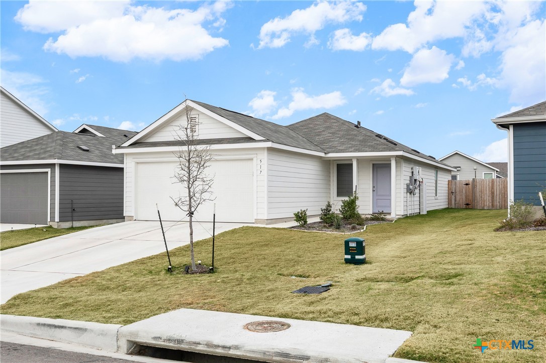 517 Texas Angel Way Jarrell, TX 76537 - Photo 5 of 35 a view of a house with a patio