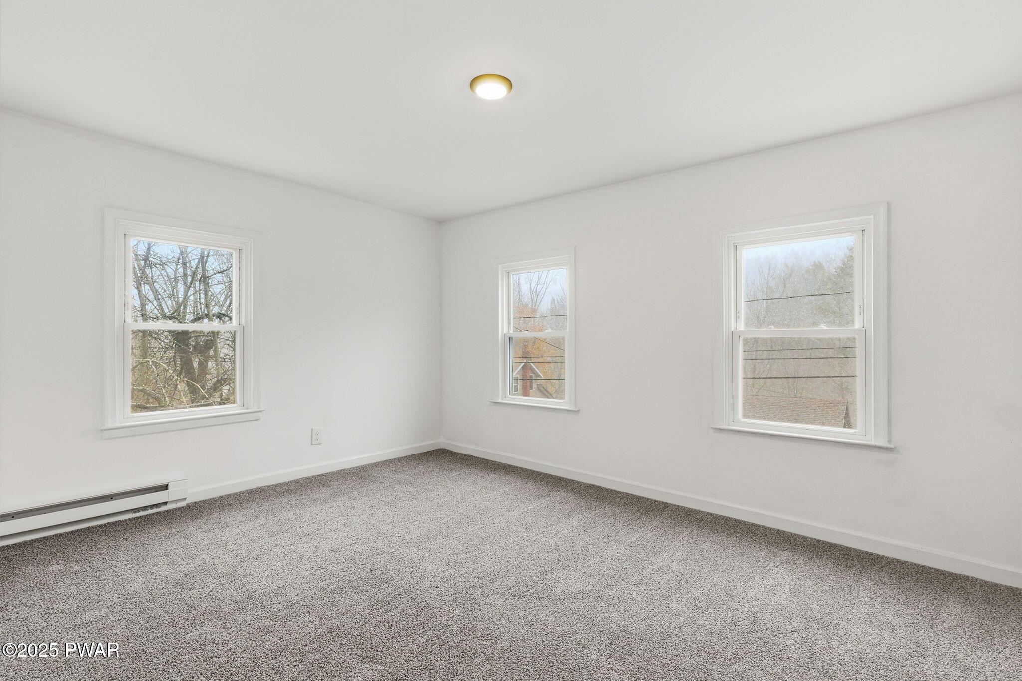74 Charles Street Hawley, PA 18428 - Photo 15 of 40 an empty room with a window