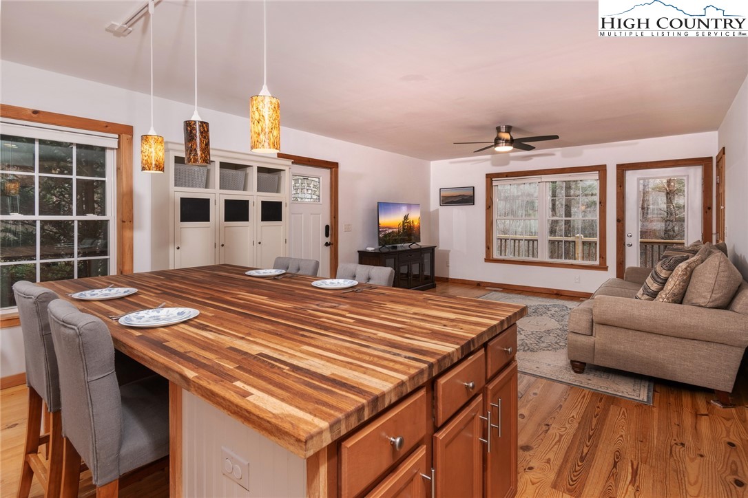 198 Eagles Path Boone, NC 28607 - Photo 16 of 44 a bedroom with a bed and a large window