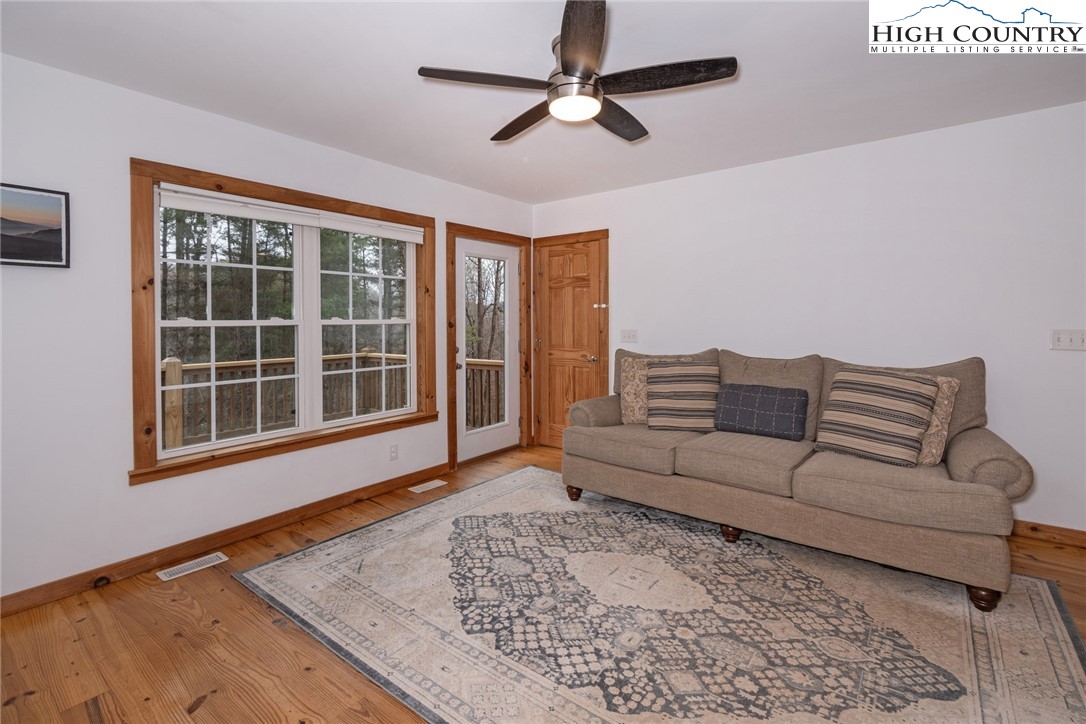 198 Eagles Path Boone, NC 28607 - Photo 21 of 44 a living room with furniture and a window