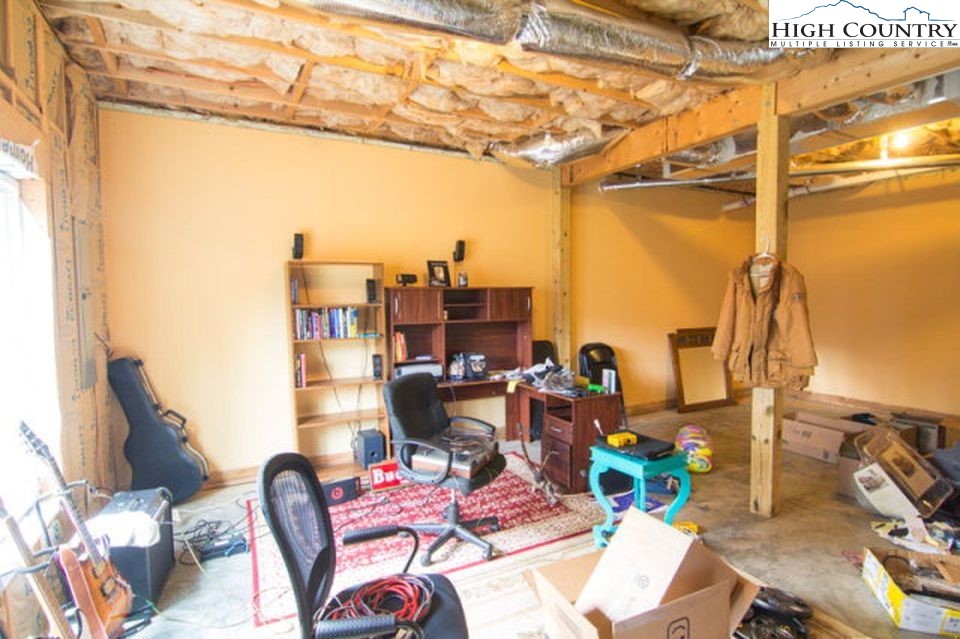 198 Eagles Path Boone, NC 28607 - Photo 32 of 44 a view of a chairs and table in a patio