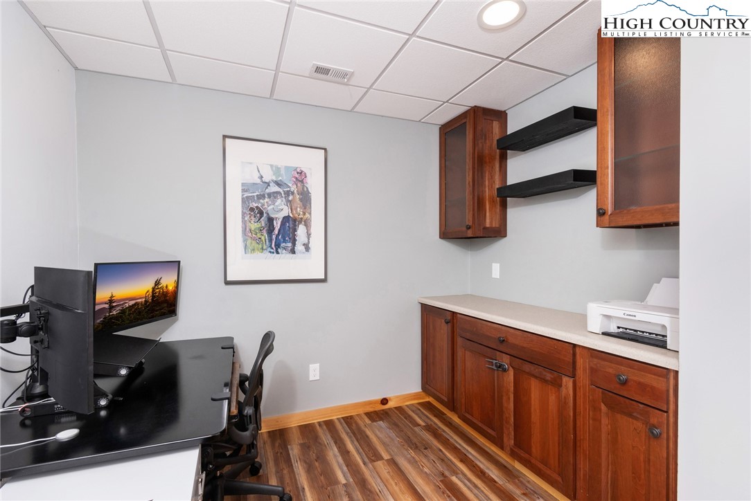 198 Eagles Path Boone, NC 28607 - Photo 37 of 44 a view of a workspace with furniture and wooden floor