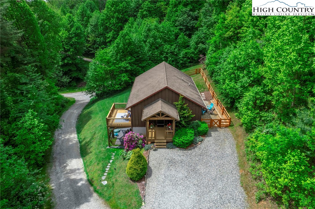198 Eagles Path Boone, NC 28607 - Photo 41 of 44 a front view of a house with garden