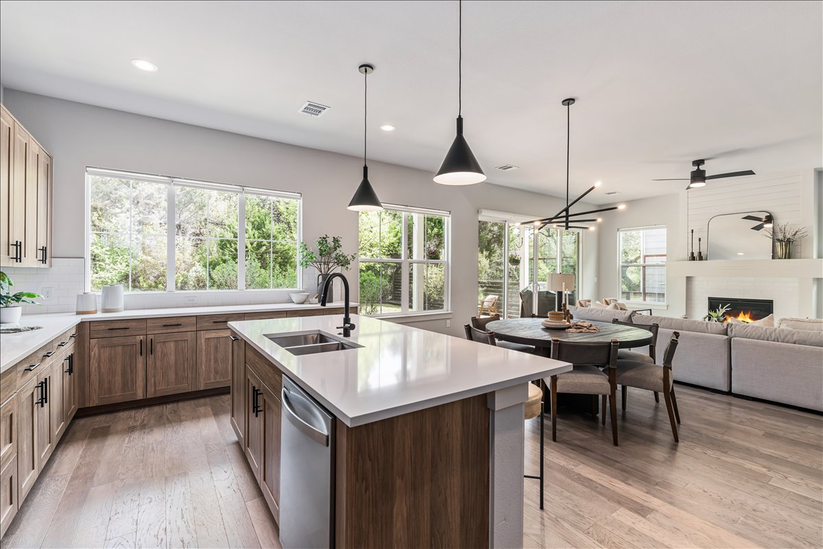 7910 Ryans Way Austin, TX 78726 - Photo 12 of 39 Quartz countertops and sleek finishes provide both beauty and functionality.