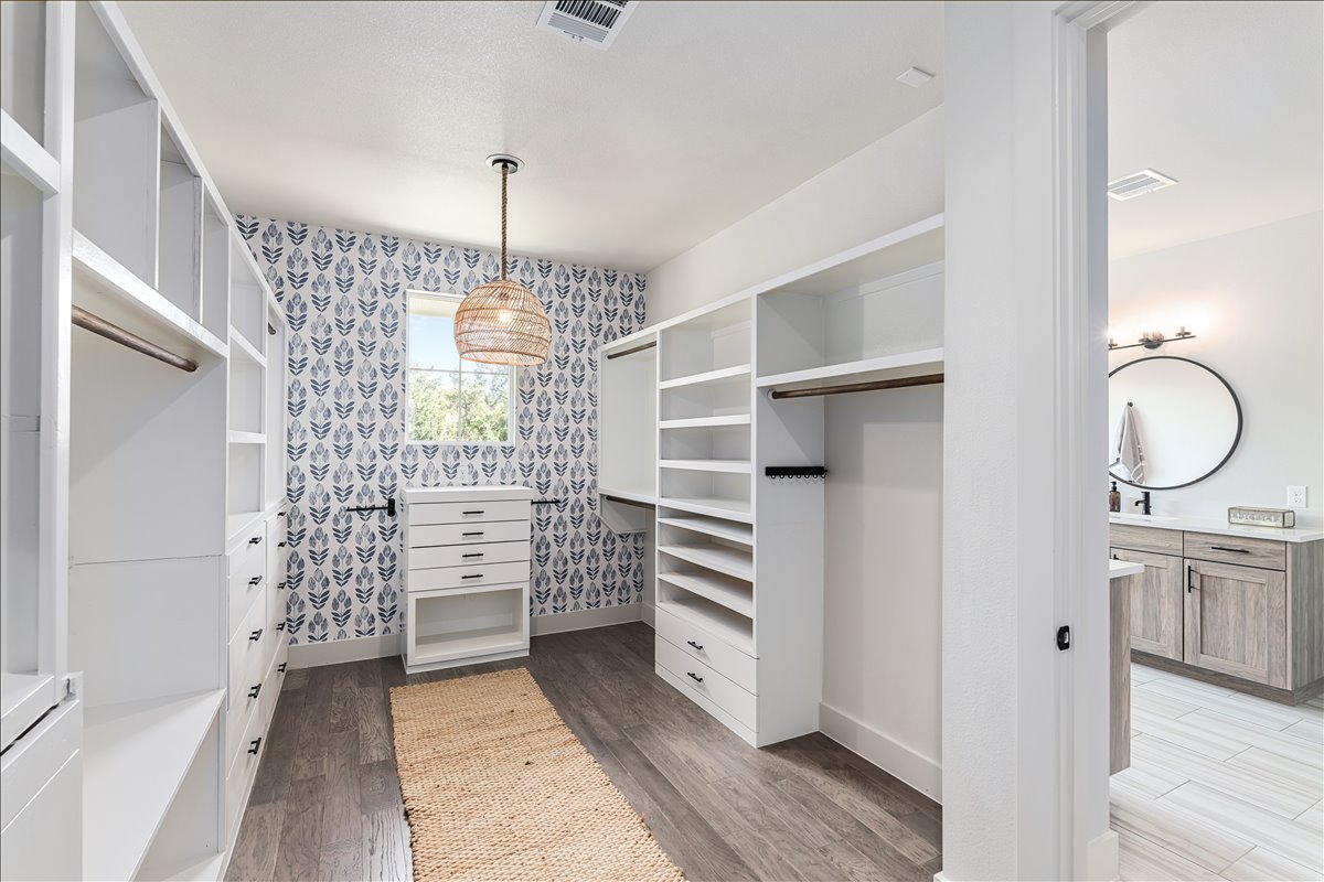 7910 Ryans Way Austin, TX 78726 - Photo 24 of 39 The oversized walk-in closet offers extensive built-in storage and organization.