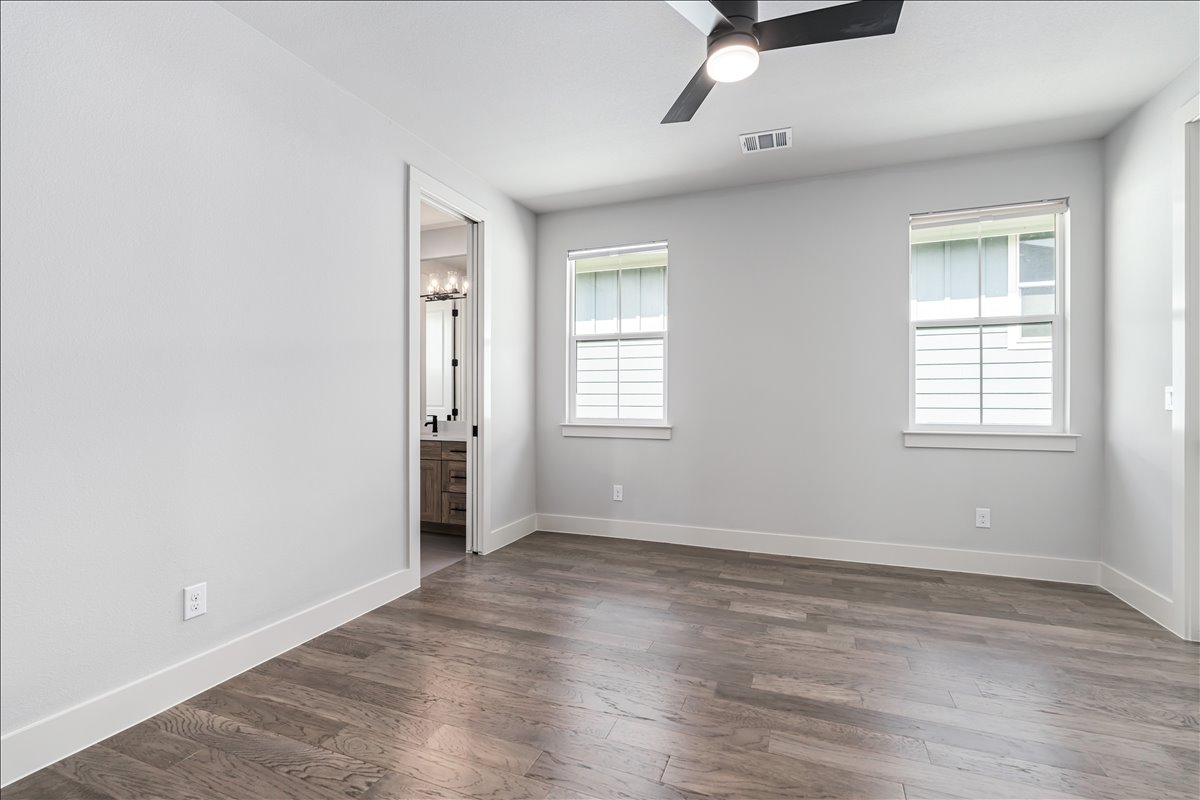 7910 Ryans Way Austin, TX 78726 - Photo 28 of 39 Spacious layouts provide plenty of room for a bed, nightstands, and additional furnishings.