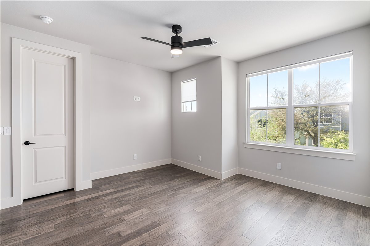 7910 Ryans Way Austin, TX 78726 - Photo 31 of 39 This bedroom offers flexibility and can easily function as a guest room, nursery, or secondary office.