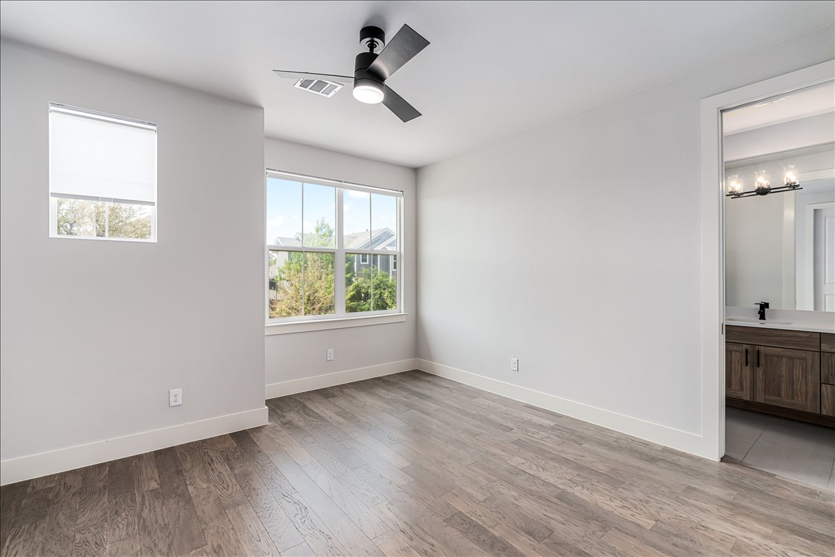 7910 Ryans Way Austin, TX 78726 - Photo 32 of 39 Generous proportions make the room comfortable for both everyday living and overnight guests.