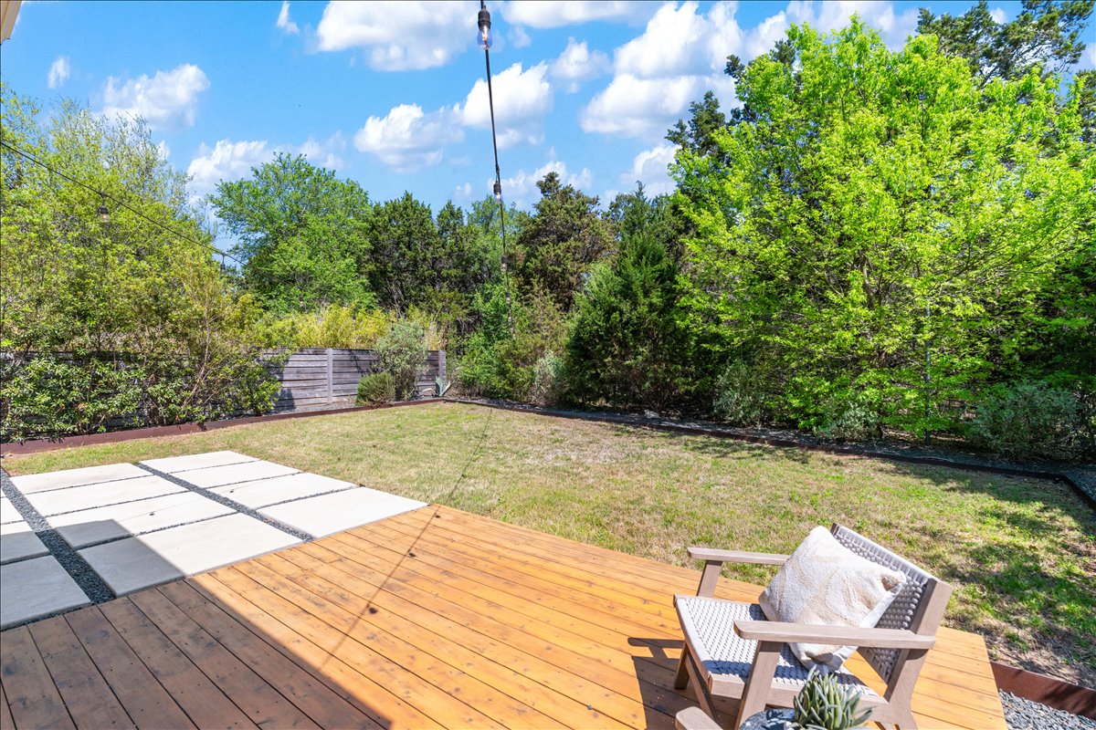 7910 Ryans Way Austin, TX 78726 - Photo 36 of 39 The patio and deck overlook the backyard and greenbelt beyond.