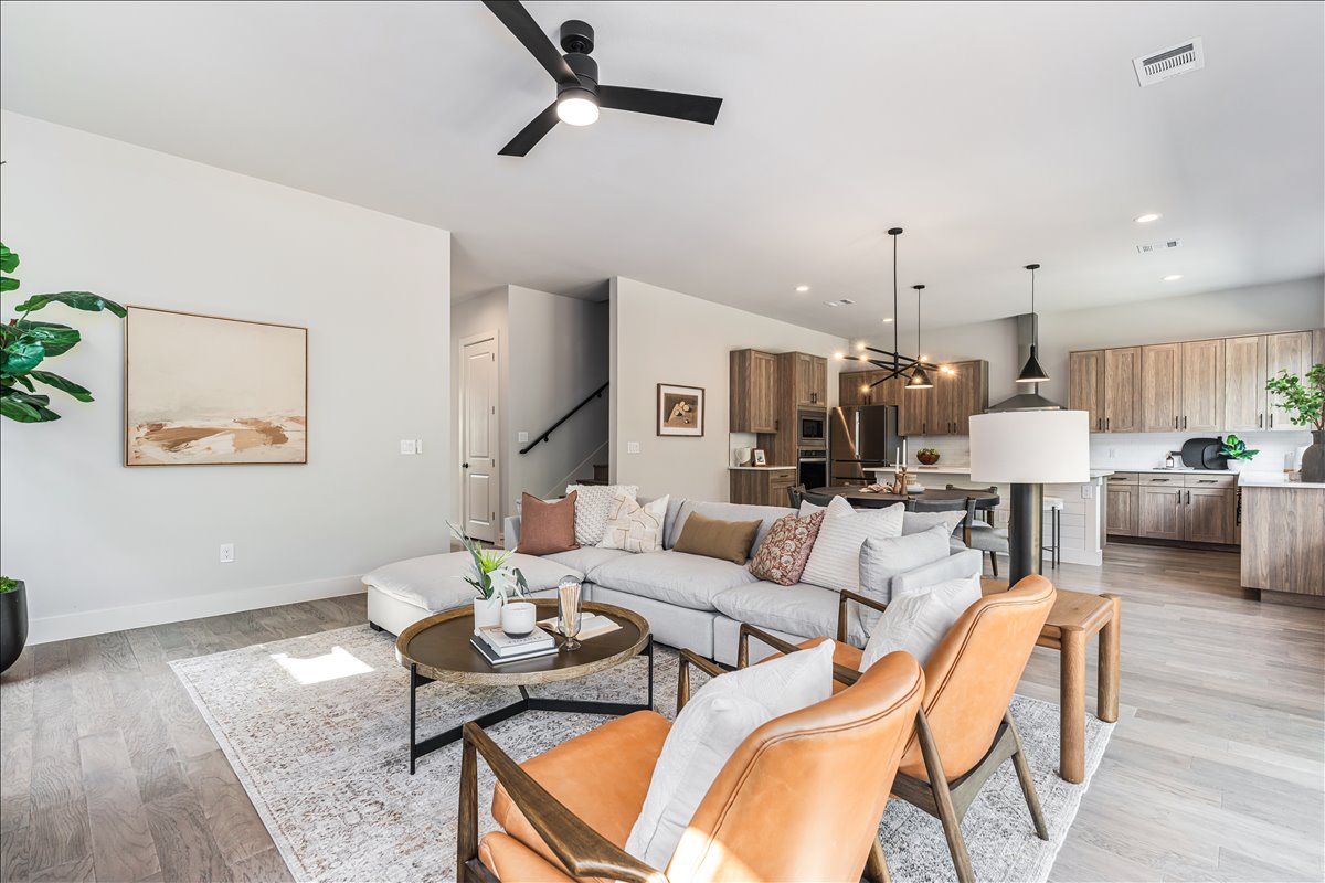 7910 Ryans Way Austin, TX 78726 - Photo 6 of 39 The open layout allows the living area to flow seamlessly into the kitchen and dining spaces.