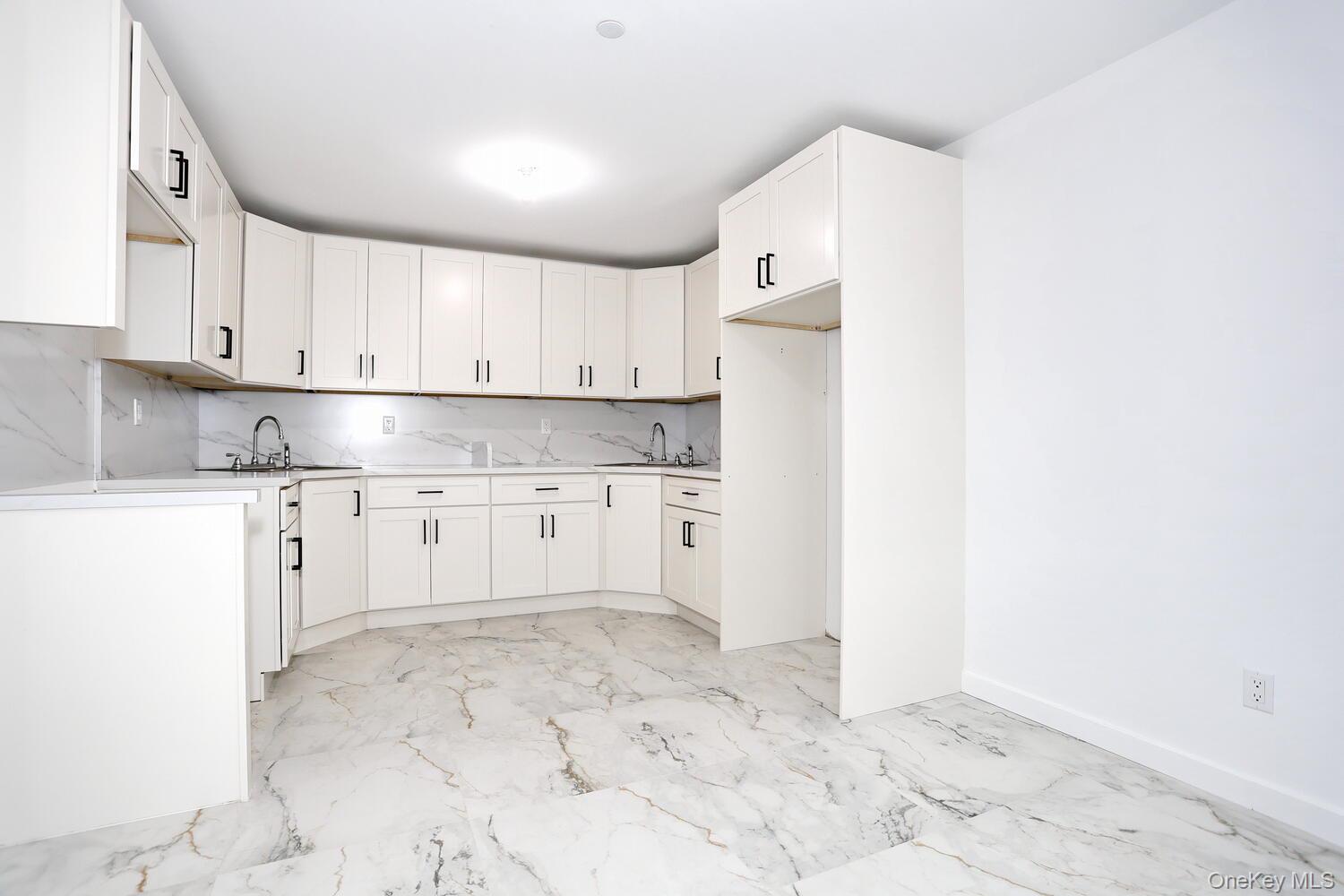 37 Ewing Avenue, Unit 202 Spring Valley, NY 10977 - Photo 35 of 50 a view of kitchen with cabinets