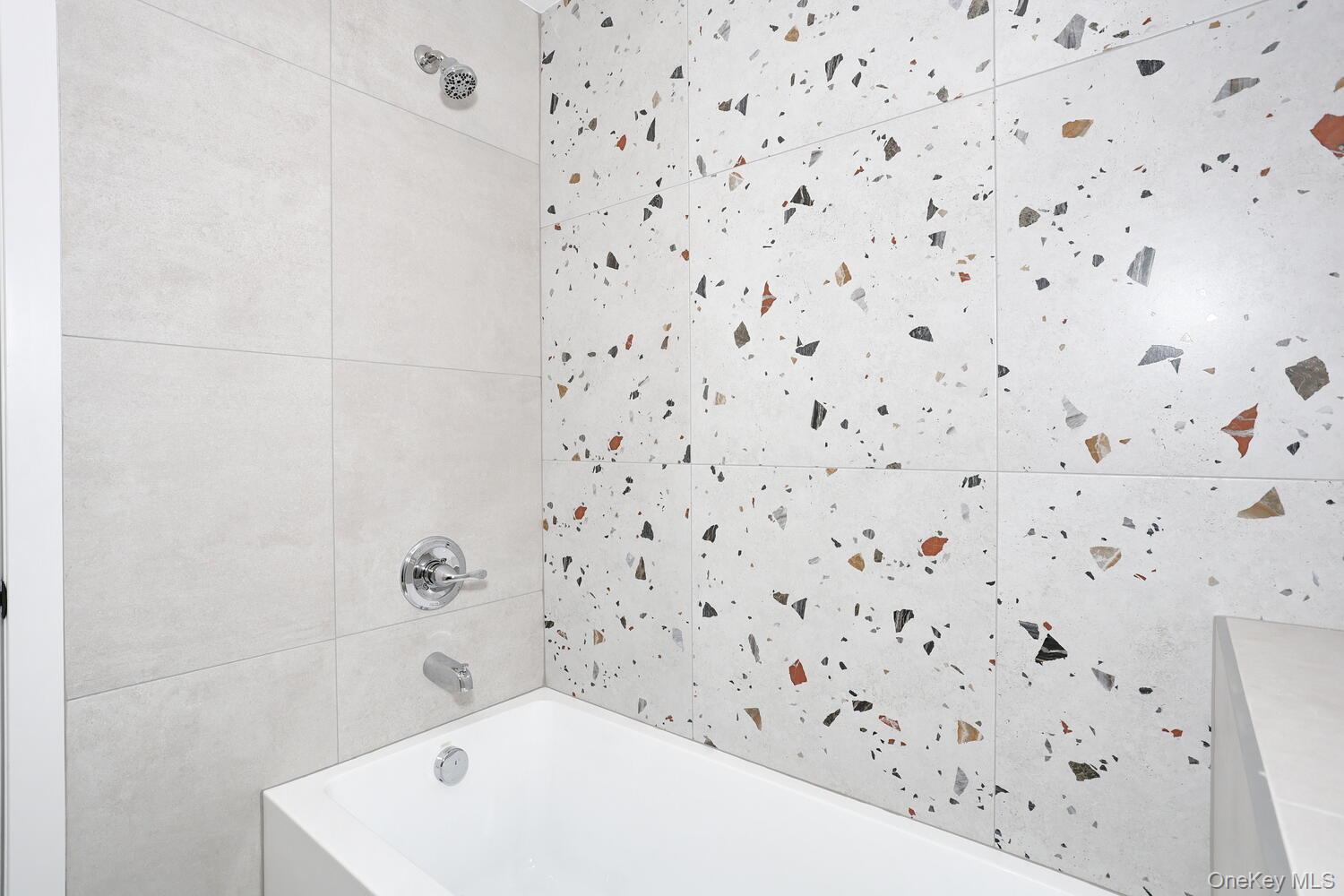 37 Ewing Avenue, Unit 202 Spring Valley, NY 10977 - Photo 40 of 50 a bathroom with a bathtub