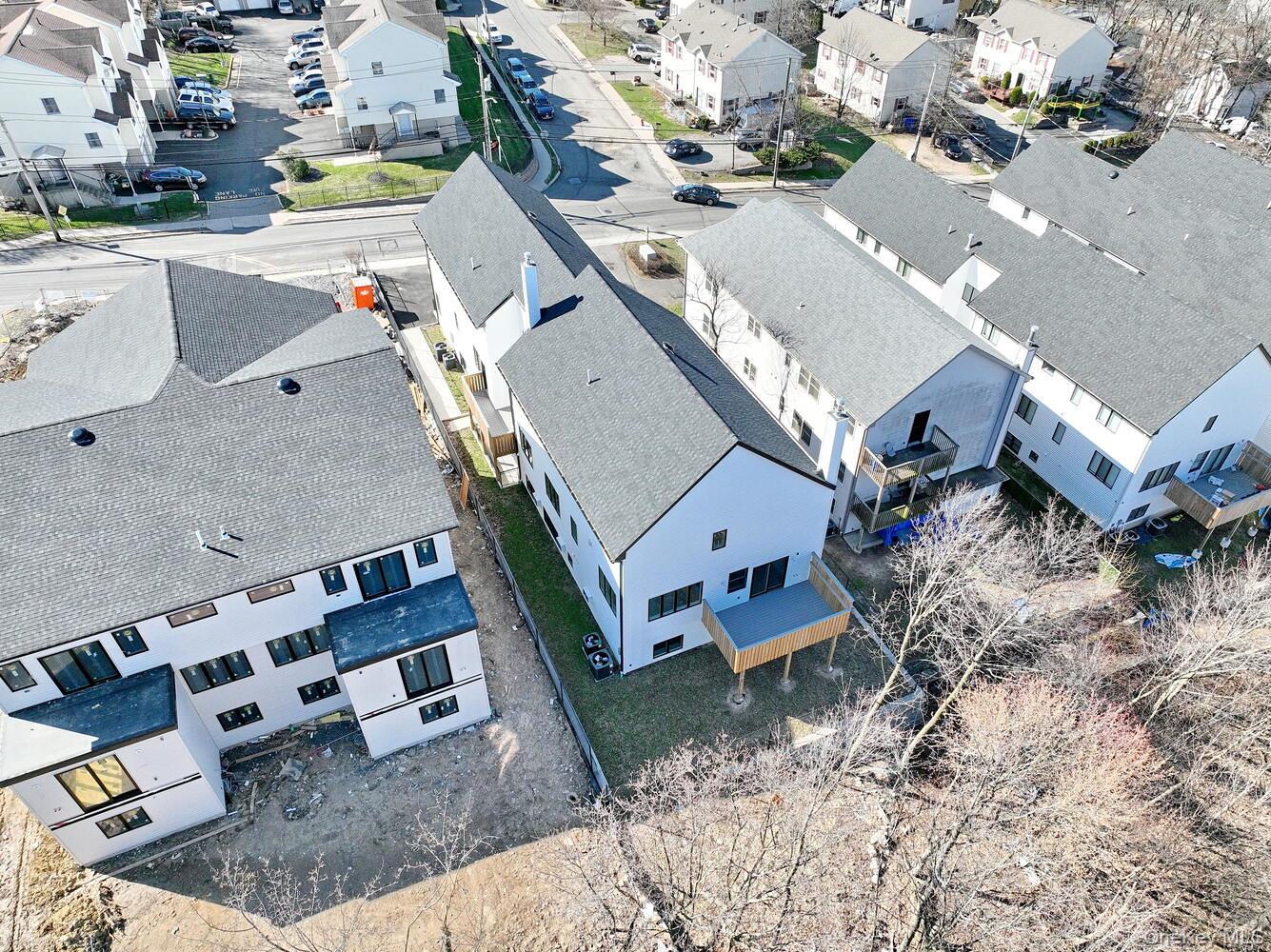 37 Ewing Avenue, Unit 202 Spring Valley, NY 10977 - Photo 50 of 50 an aerial view of a house with a yard