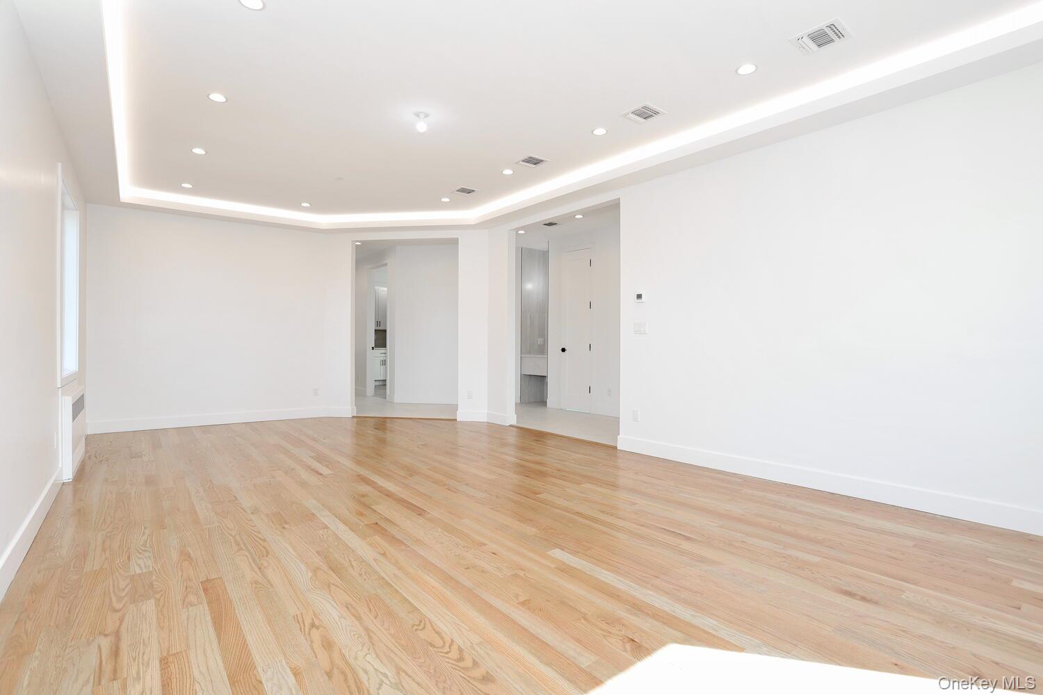 37 Ewing Avenue, Unit 202 Spring Valley, NY 10977 - Photo 7 of 50 an empty room with wooden floor