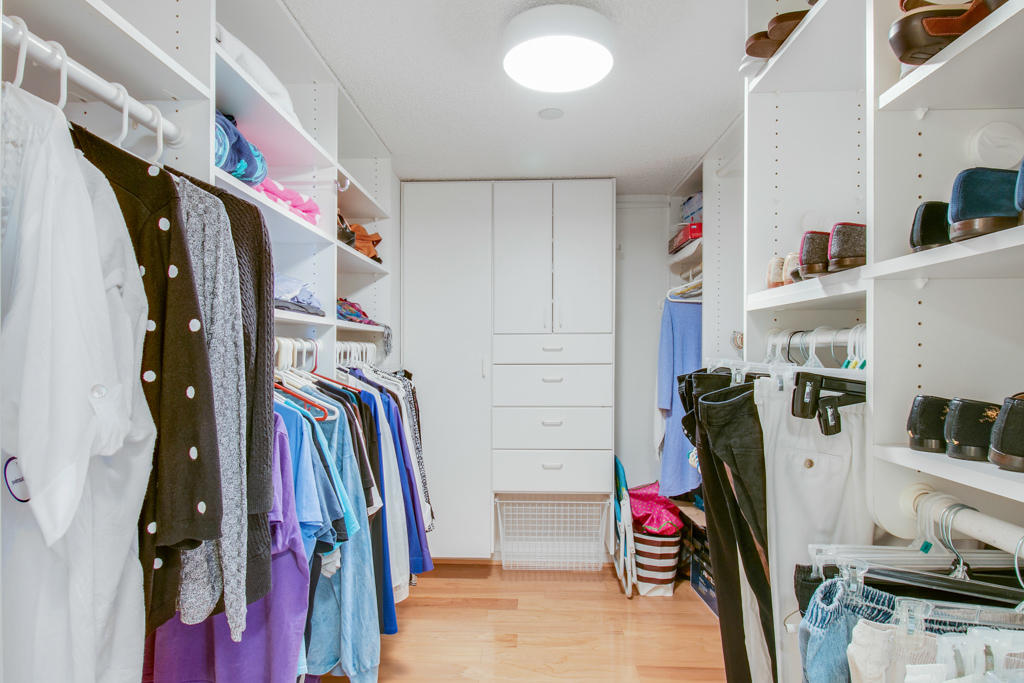 4100 North Ocean Drive, Unit 1002 Singer Island, FL 33404 - Photo 17 of 37 a view of walk in closet with clothes
