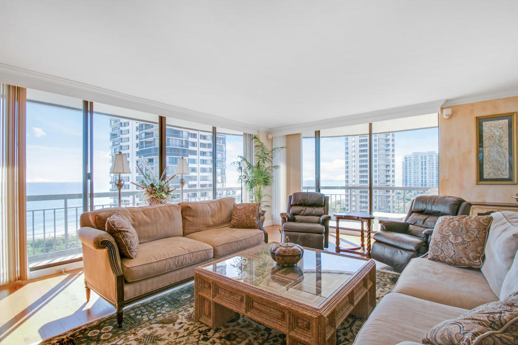 4100 North Ocean Drive, Unit 1002 Singer Island, FL 33404 - Photo 2 of 37 a living room with furniture and a large window