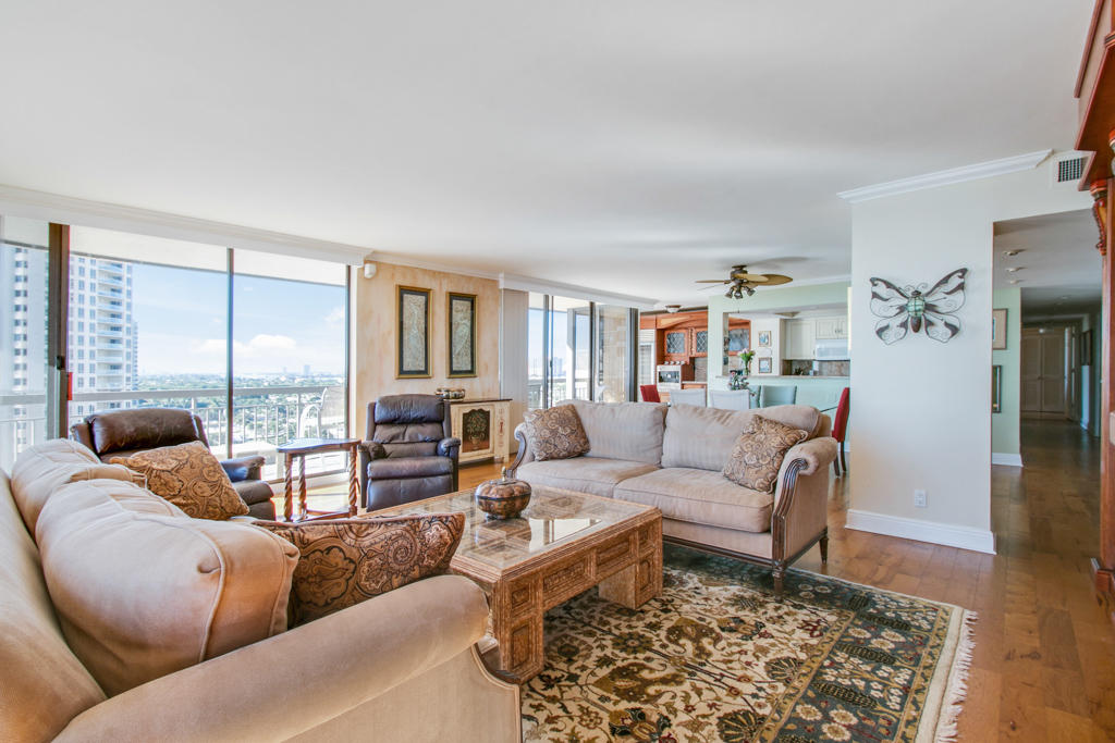 4100 North Ocean Drive, Unit 1002 Singer Island, FL 33404 - Photo 3 of 37 a living room with furniture and a rug
