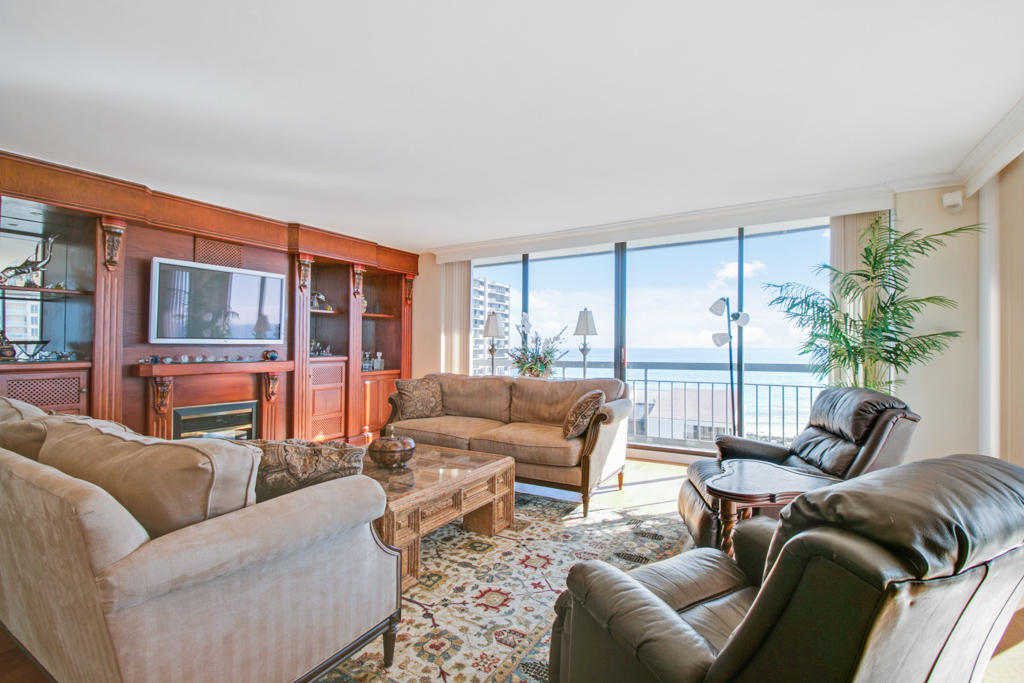 4100 North Ocean Drive, Unit 1002 Singer Island, FL 33404 - Photo 10 of 37 a living room with furniture and a large window