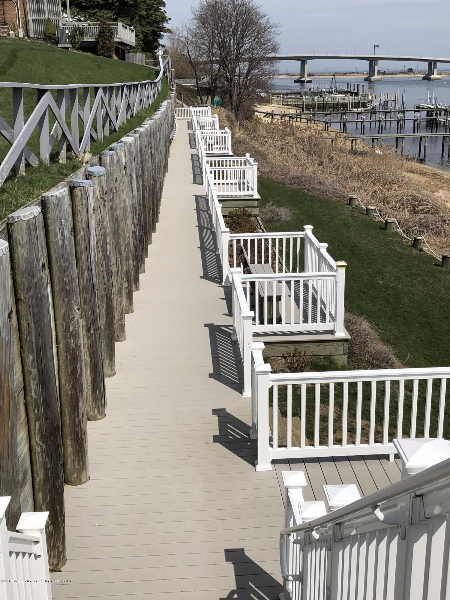 200 Portland Road, Unit C2 Highlands, NJ 07732 - Photo 5 of 18 200 C2 walkway w seating