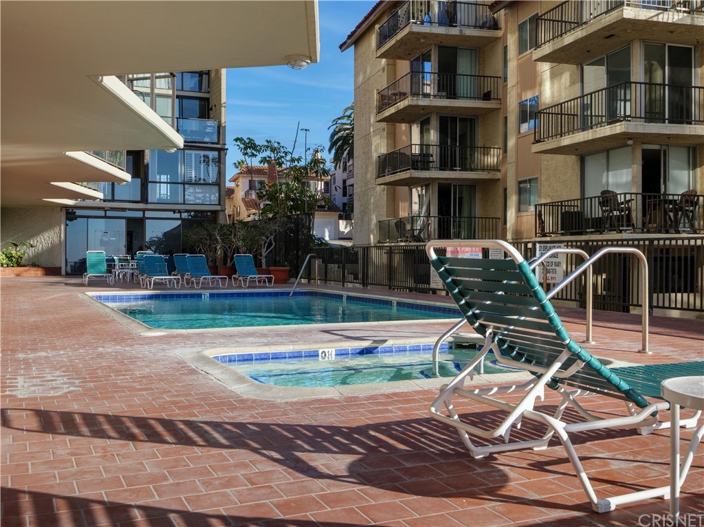 531 Esplanade, Unit 913 Redondo Beach, CA 90277 - Photo 36 of 42 a view of a brick building with many windows