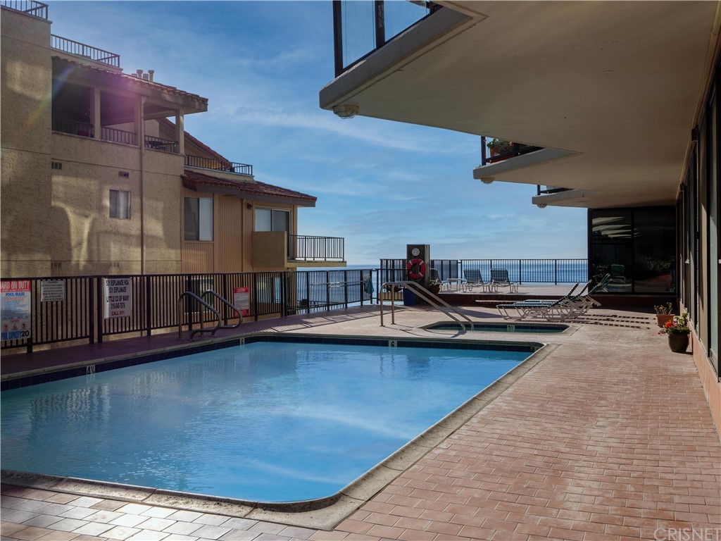 531 Esplanade, Unit 913 Redondo Beach, CA 90277 - Photo 38 of 42 a living room with furniture pool and a table