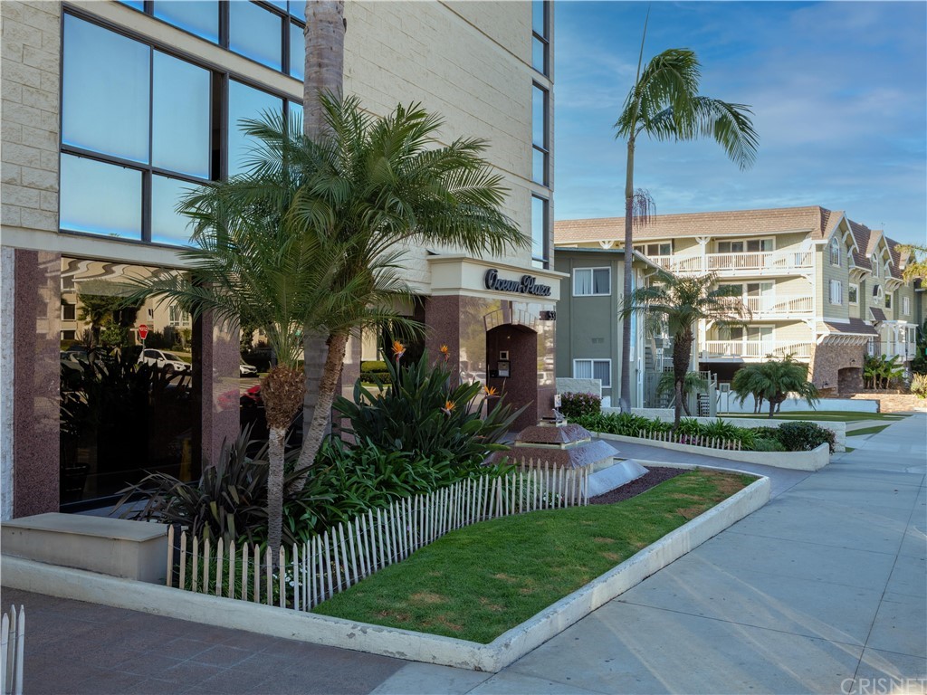 531 Esplanade, Unit 913 Redondo Beach, CA 90277 - Photo 4 of 42 a view of a house with a yard and potted plants