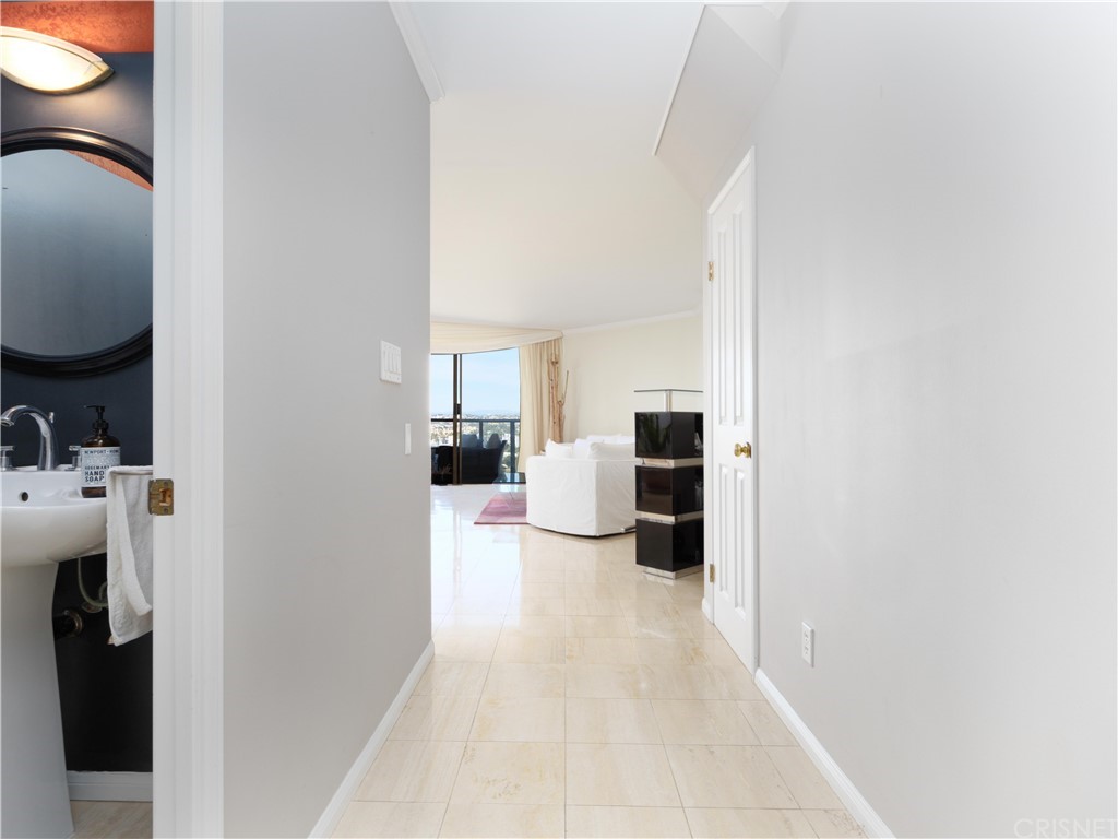 531 Esplanade, Unit 913 Redondo Beach, CA 90277 - Photo 7 of 42 a view of a living room with furniture and a lamp