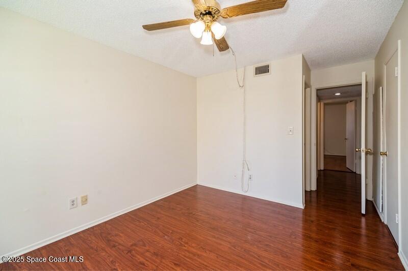 1225 North Wickham Road, Unit 613 Melbourne, FL 32935 - Photo 11 of 30 Primary Bedroom