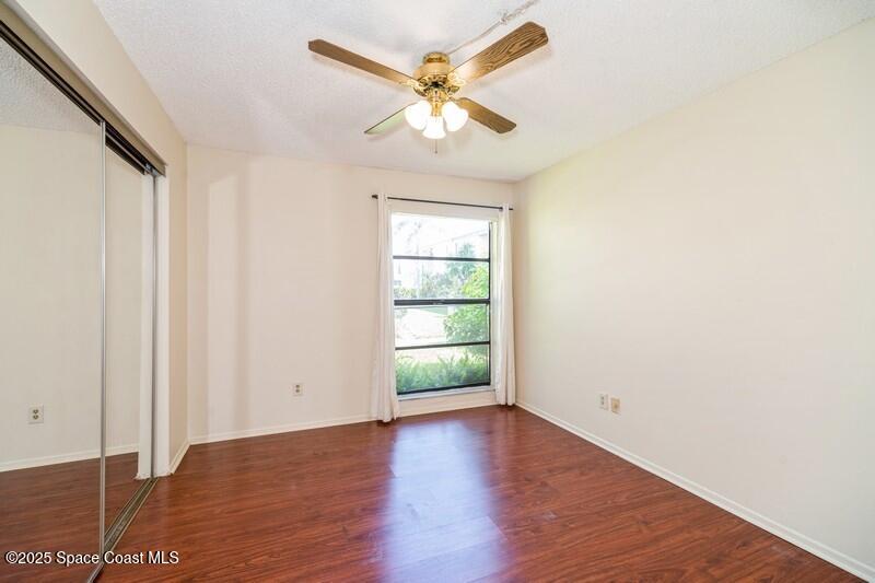 1225 North Wickham Road, Unit 613 Melbourne, FL 32935 - Photo 9 of 30 Primary Bedroom