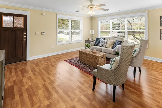 a living room with furniture and a window