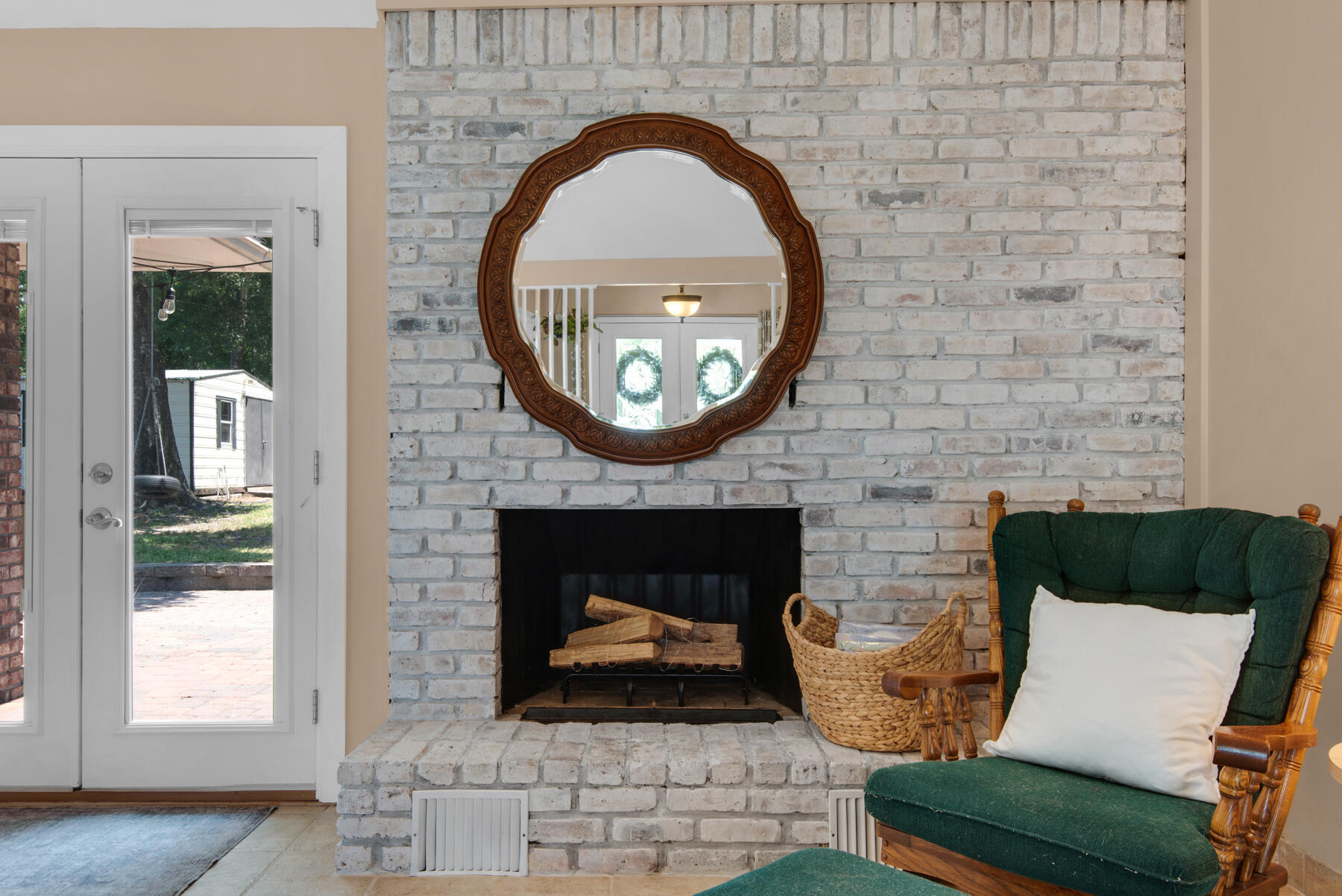 310 Antiqua Way Niceville, FL 32578 - Photo 11 of 39 an outdoor living space with furniture and a fireplace