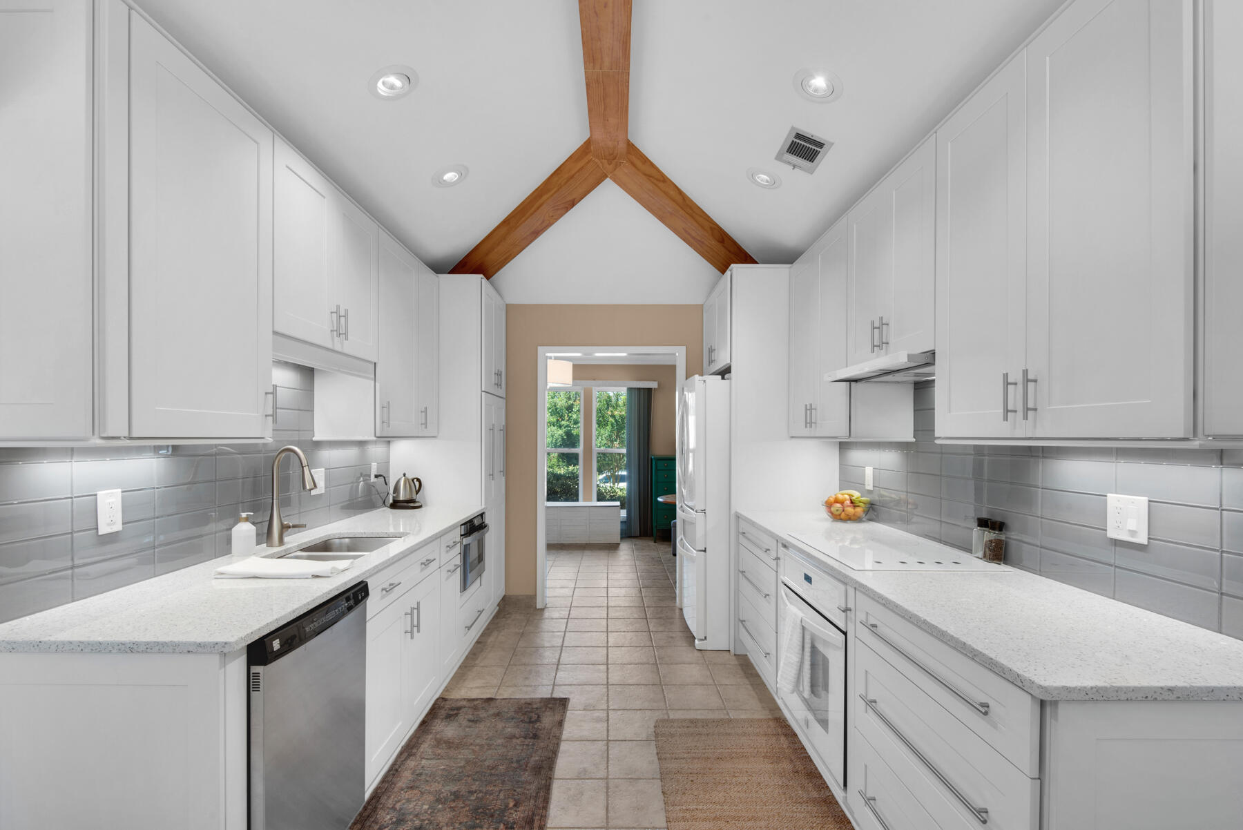 310 Antiqua Way Niceville, FL 32578 - Photo 12 of 39 a kitchen with counter top space sink stove and cabinets