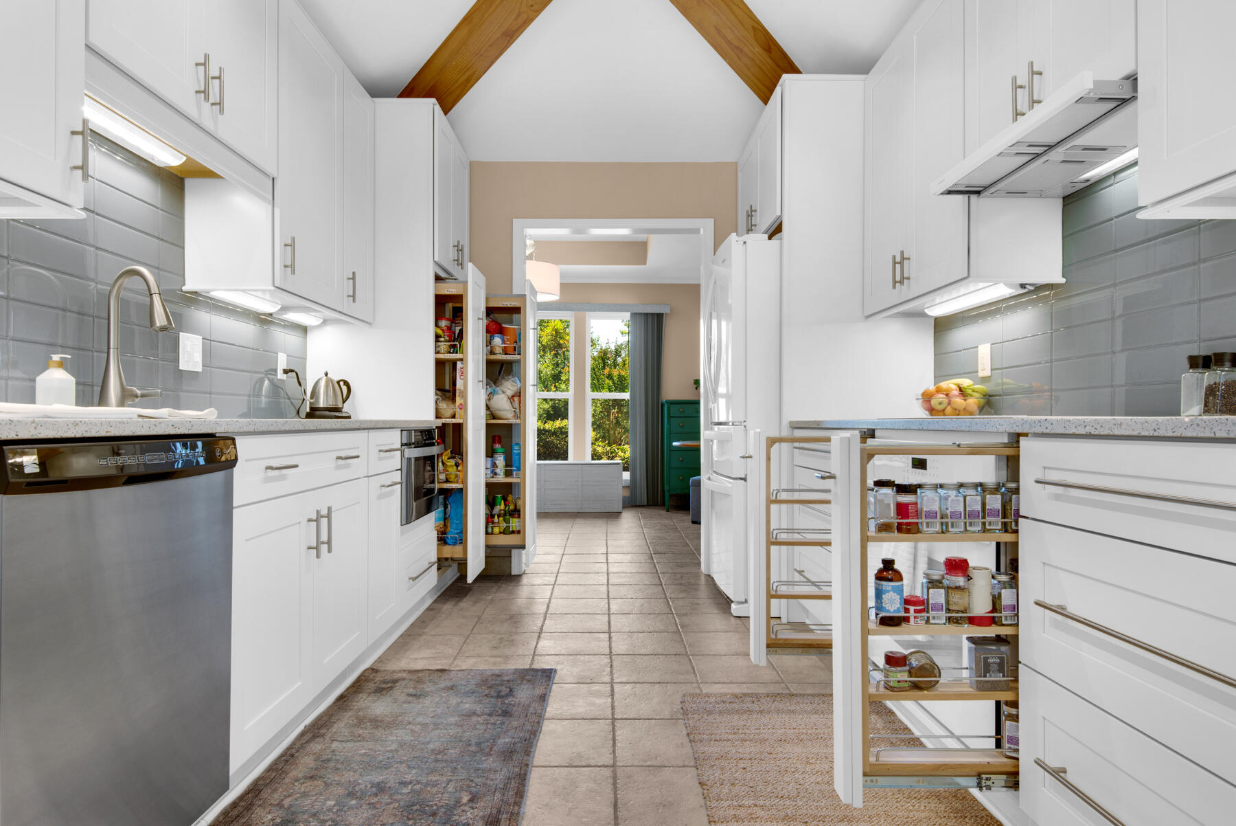 310 Antiqua Way Niceville, FL 32578 - Photo 14 of 39 a kitchen with a cabinets and white appliances