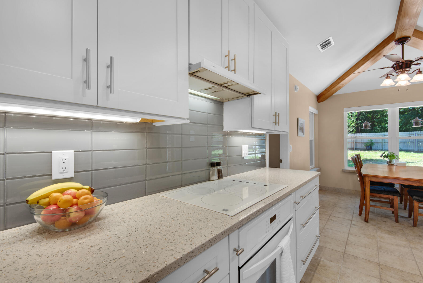 310 Antiqua Way Niceville, FL 32578 - Photo 15 of 39 a kitchen with a sink and cabinets